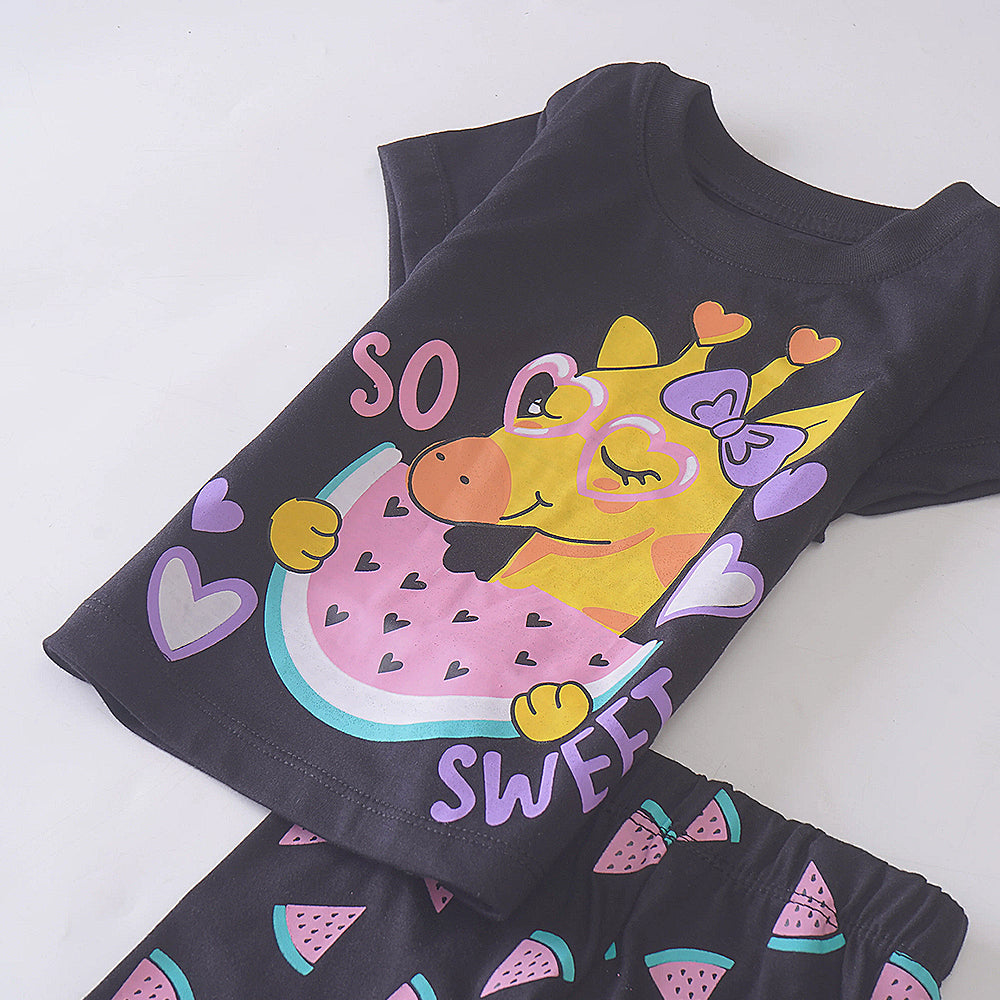 Giraffe Slumber: Black Pajama Set with Whimsical Design