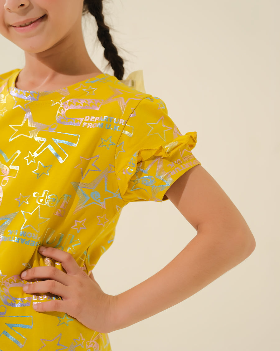 Bright & Playful: Young Girl in Yellow Print Top